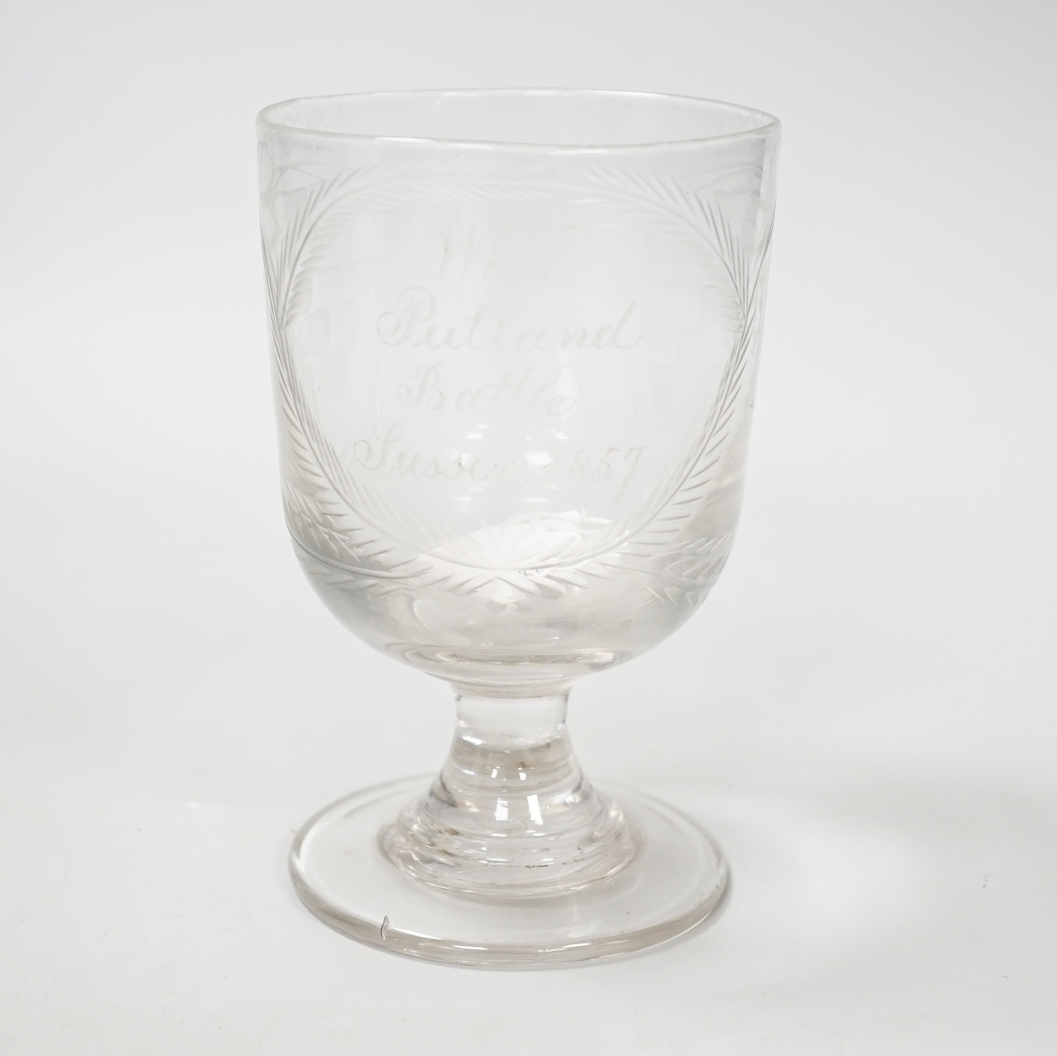 A documentary rummer related to Battle In Sussex, of English lead crystal and dating to C1790-1800 the later scripted dedication reads ‘W & E Putland, Battle, Sussex, 1857’, 14cm